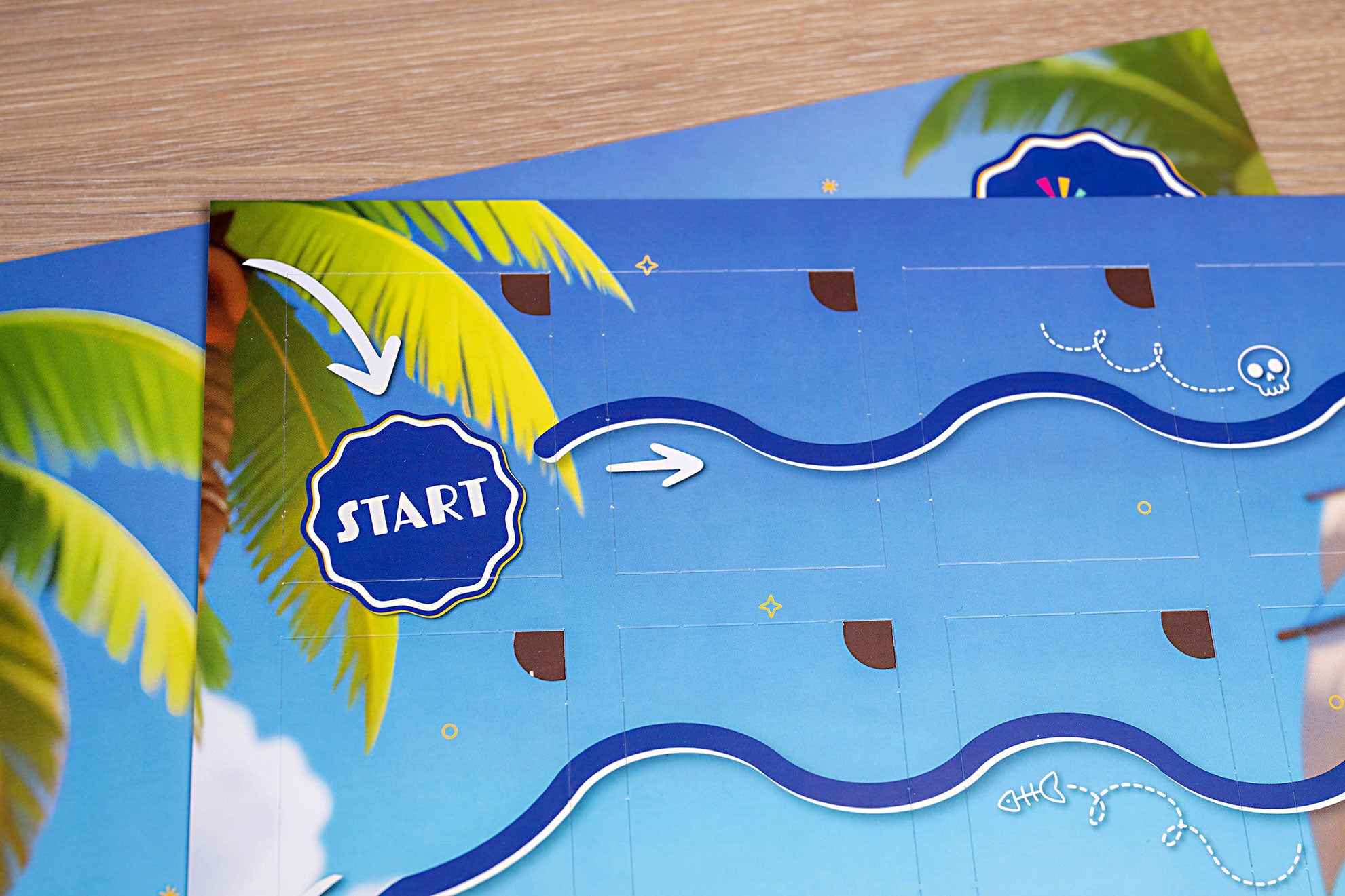 Schlangenlinie im Piratenkalender mit Startpunkt und Palmen